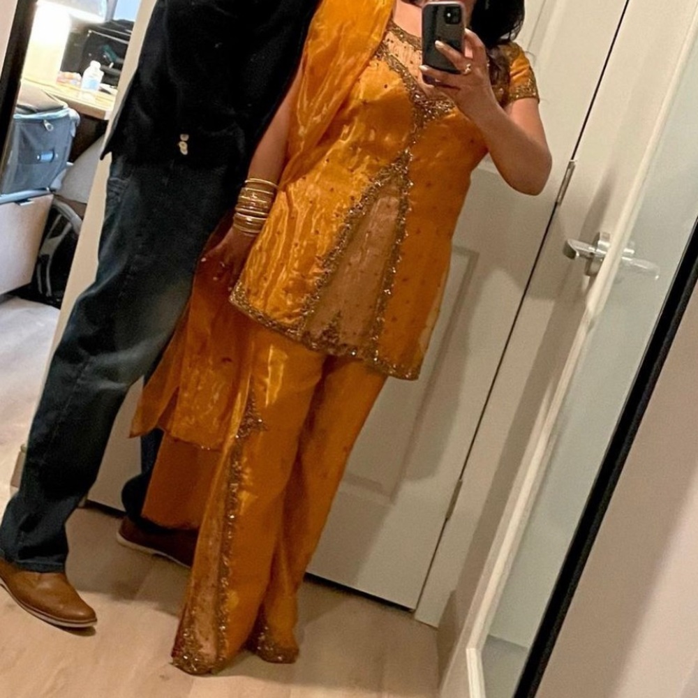 Gorgeous rust and bronze with handwork detail salwar.